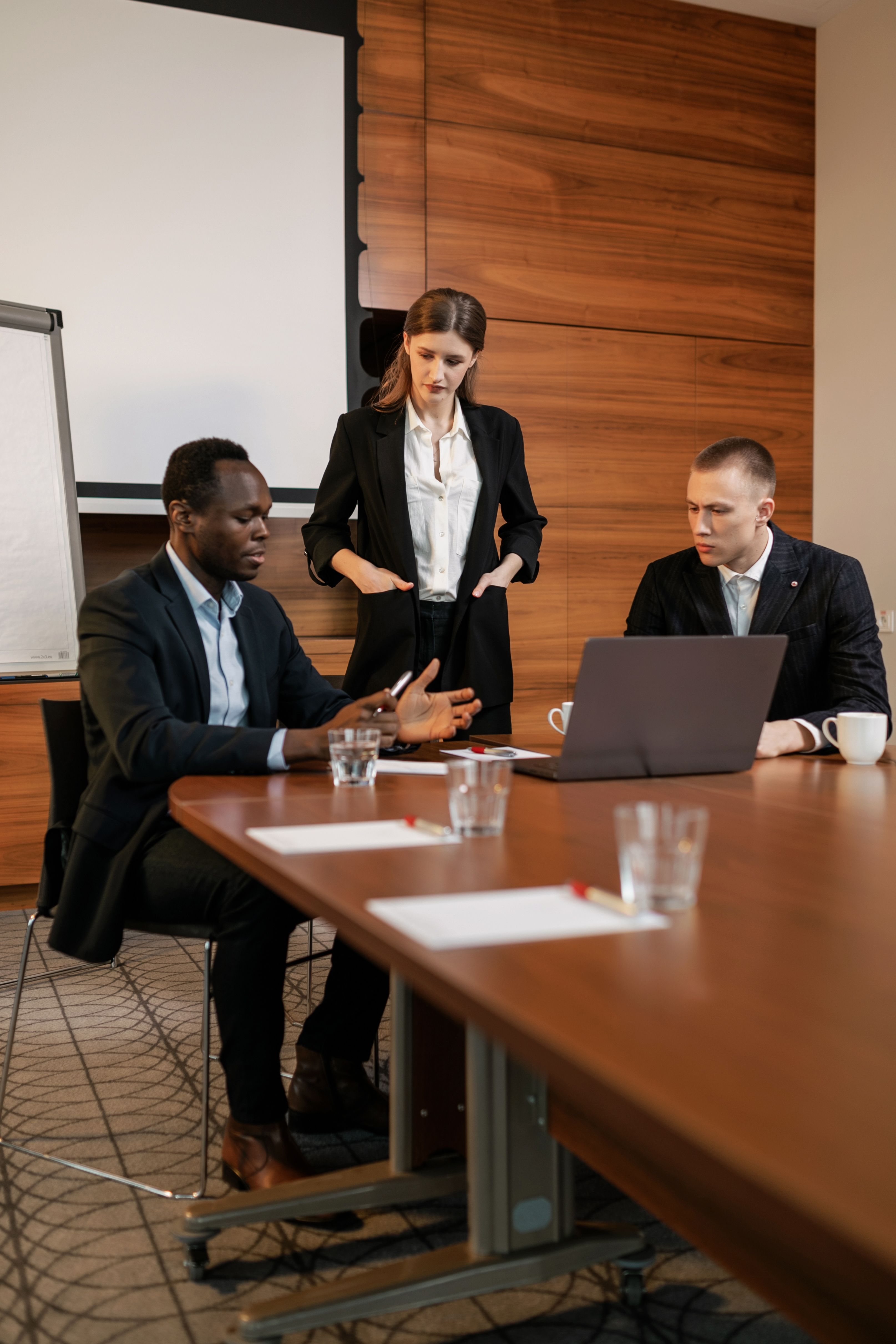 African business leaders reviewing reports formally